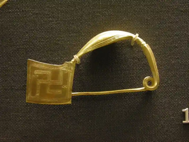 Swastika on a prechristian gold fibulae
